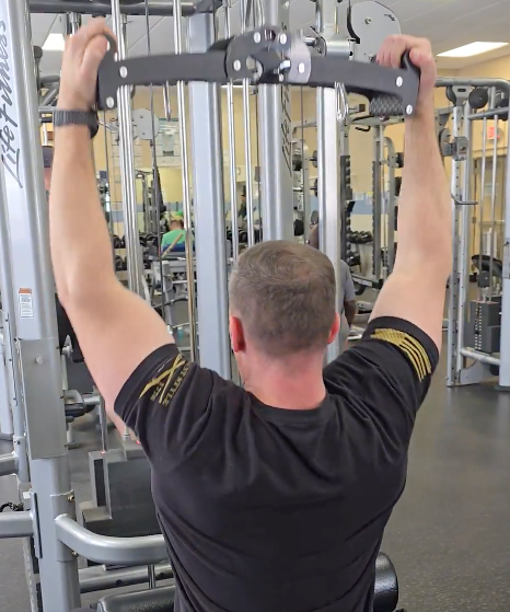 Seth W. using the Back Bar